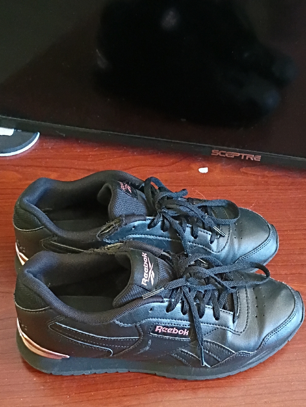 Reebok Women’s Black Athletic Sneakers with Pink Accent